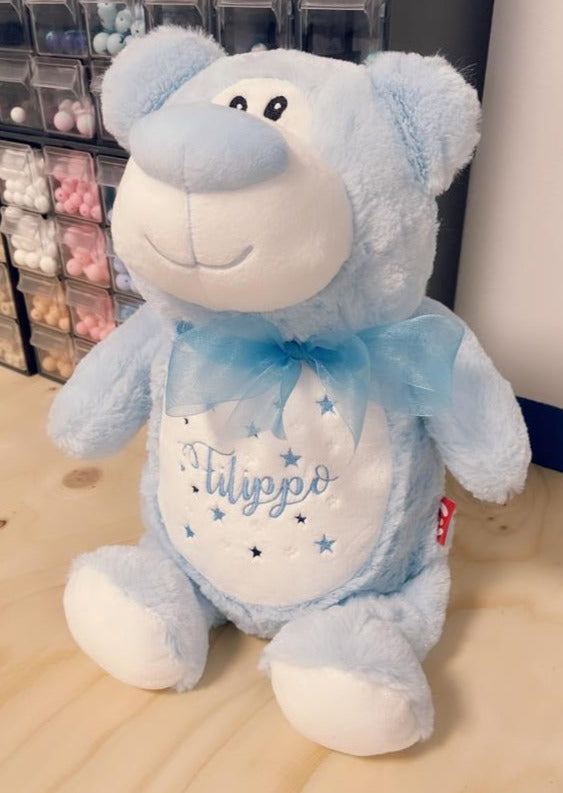 Orsetto peluches piccolo con nastro azzurro per confezionare dolci